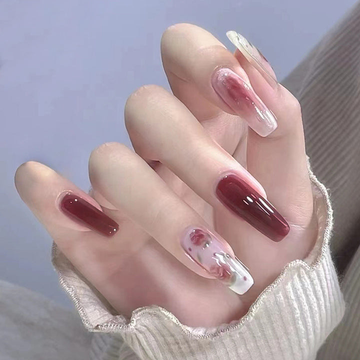 Red roses adorned with nails