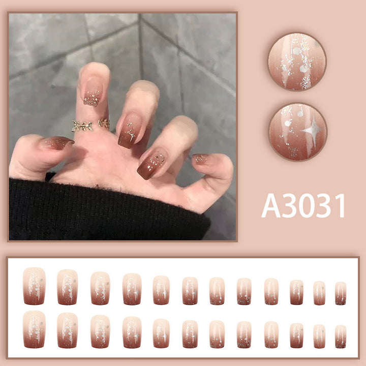 High-end and luxurious aesthetic manicure with a gradient of warm caramel and amber tones, creating a sense of atmosphere.