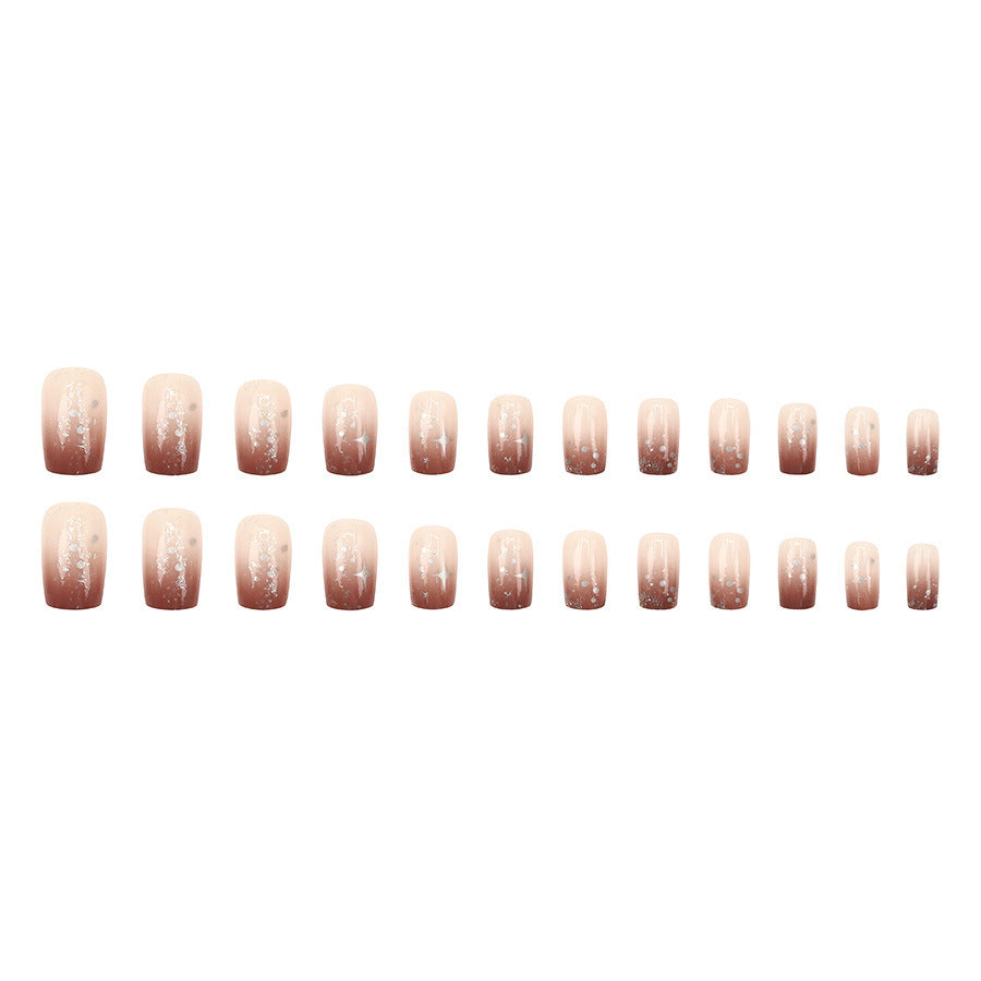 High-end and luxurious aesthetic manicure with a gradient of warm caramel and amber tones, creating a sense of atmosphere.