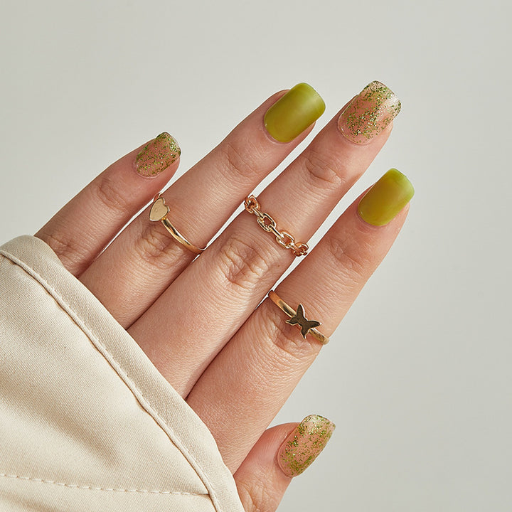 shimmering soft green nail polish