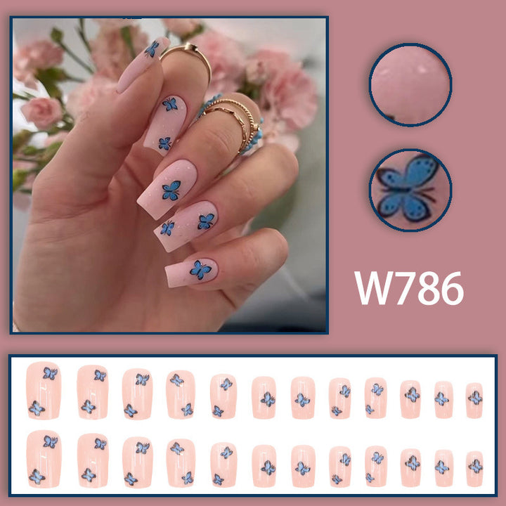 Blue butterfly spirit, pink manicure
