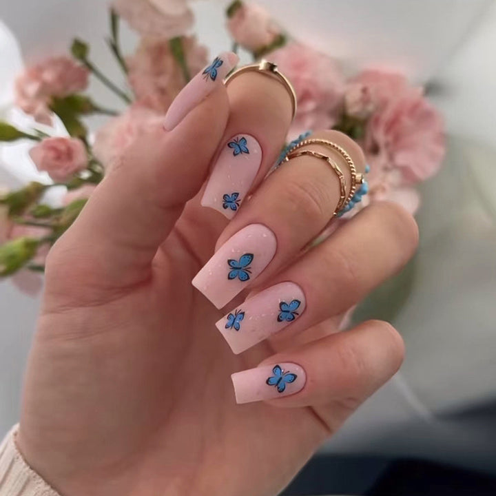 Blue butterfly spirit, pink manicure
