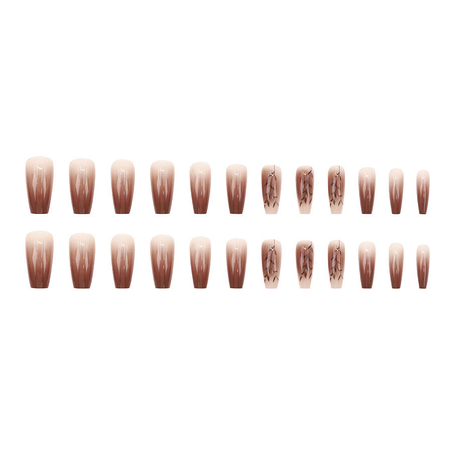 Fall and winter leaf nail art with caramel brown color, exuding a sophisticated and elegant vibe.