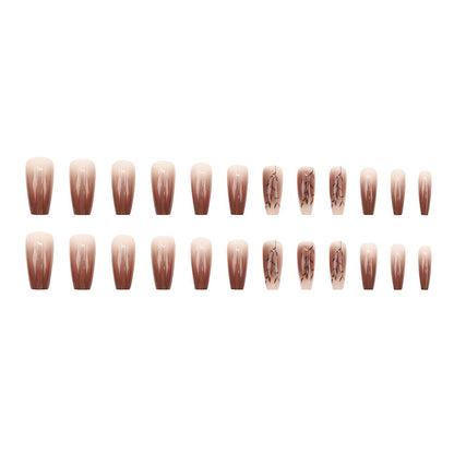 Fall and winter leaf nail art with caramel brown color, exuding a sophisticated and elegant vibe.