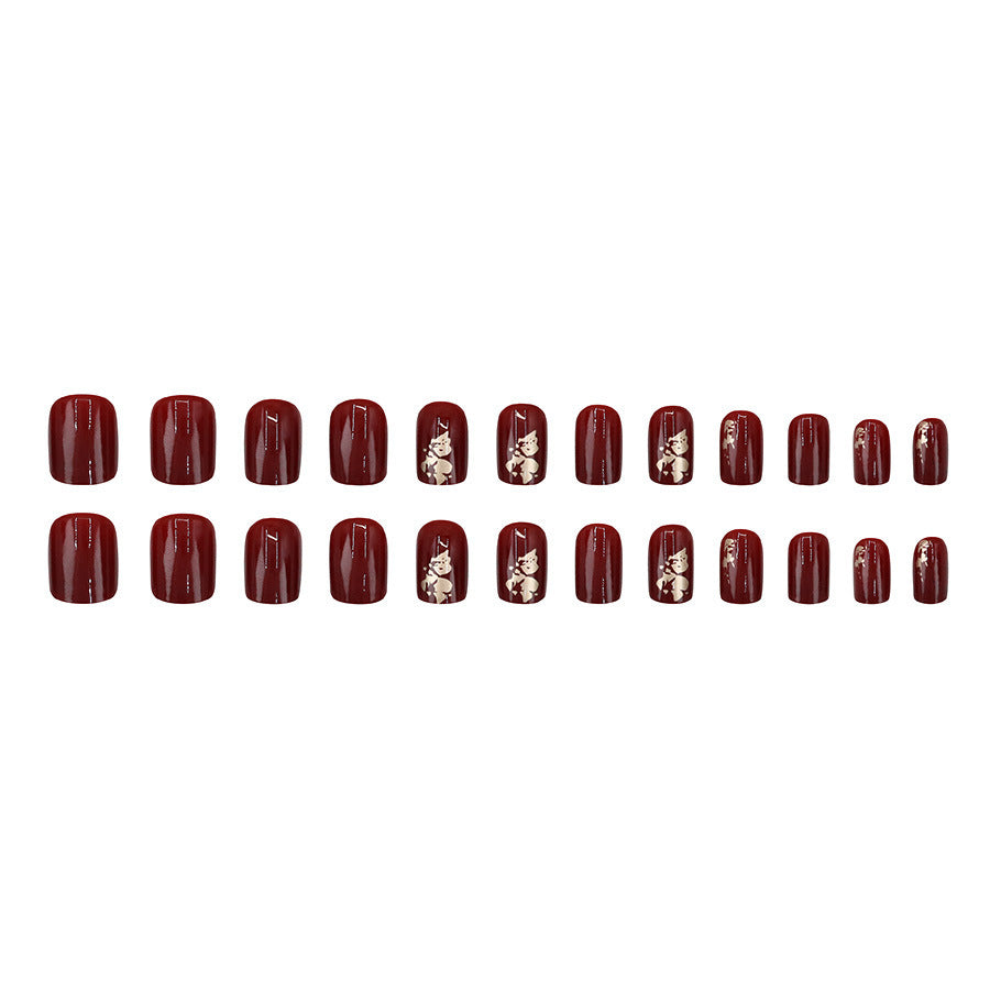 Anclara's red manicured nails