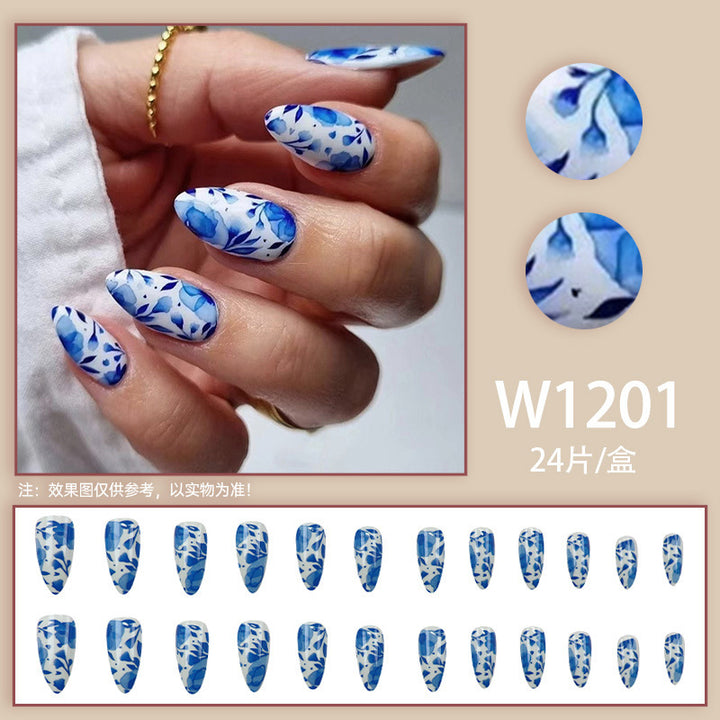 Blue misty clouds, flowing floral patterns, adorned with nail designs