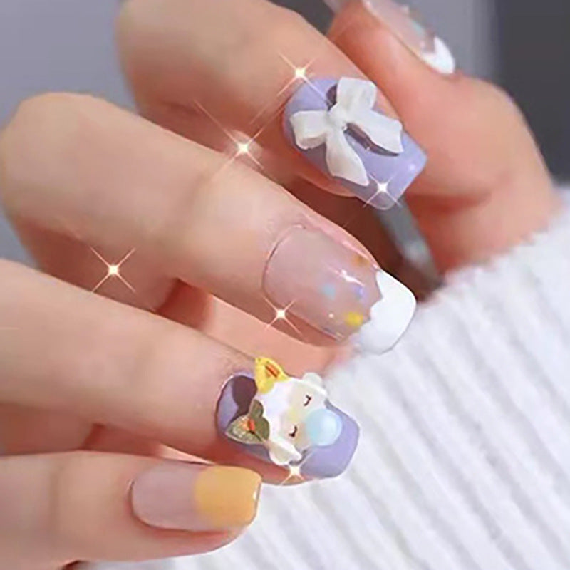 Cute student blowing bubbles, bow tie manicure