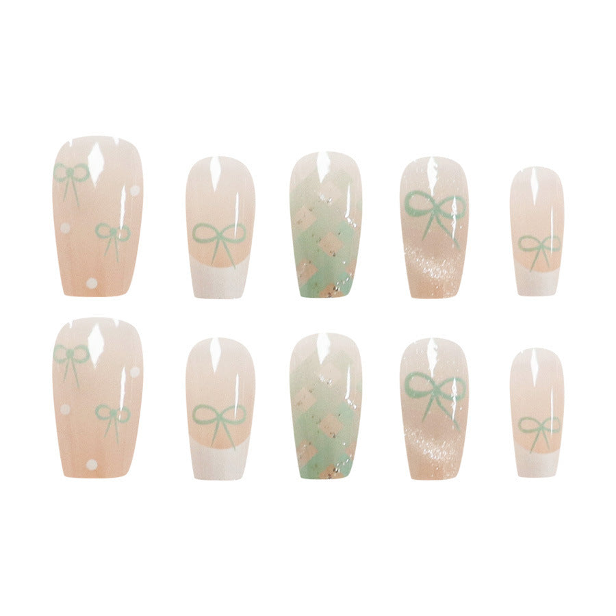 Bows and polka dot cat-eye manicure