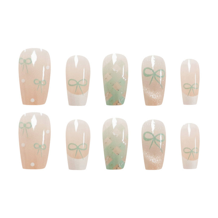 Bows and polka dot cat-eye manicure