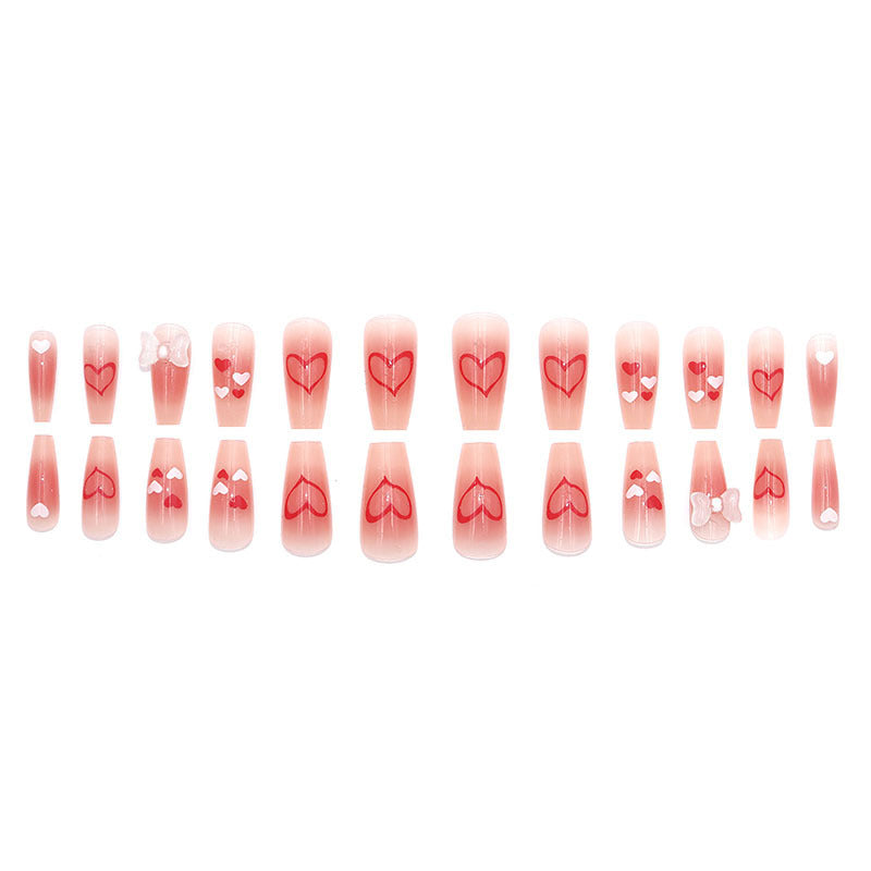 Mid-length pink diamond-style bow nail art