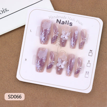Pearl crystal butterfly rose nail art