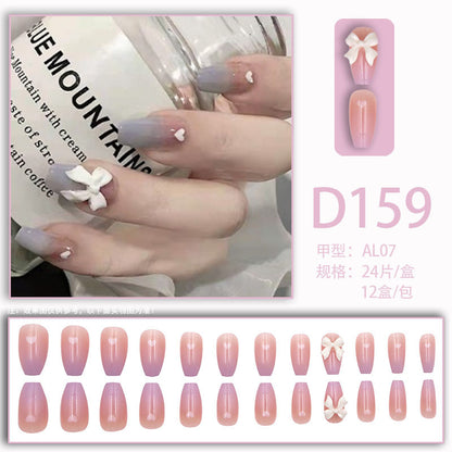 Gradually changing small heart-shaped bow accessory for nails