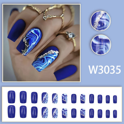 Blue shading with golden stripes on a long-style manicure