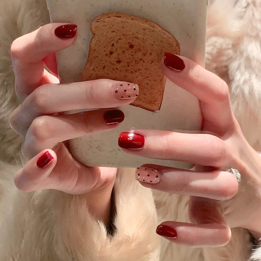 Red polka dot nude pink bow-shaped nail art