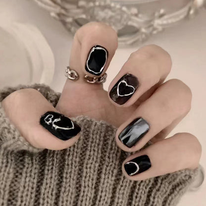 Dark magic black heart nail polish