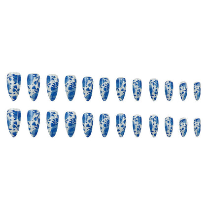 Blue misty clouds, flowing floral patterns, adorned with nail designs
