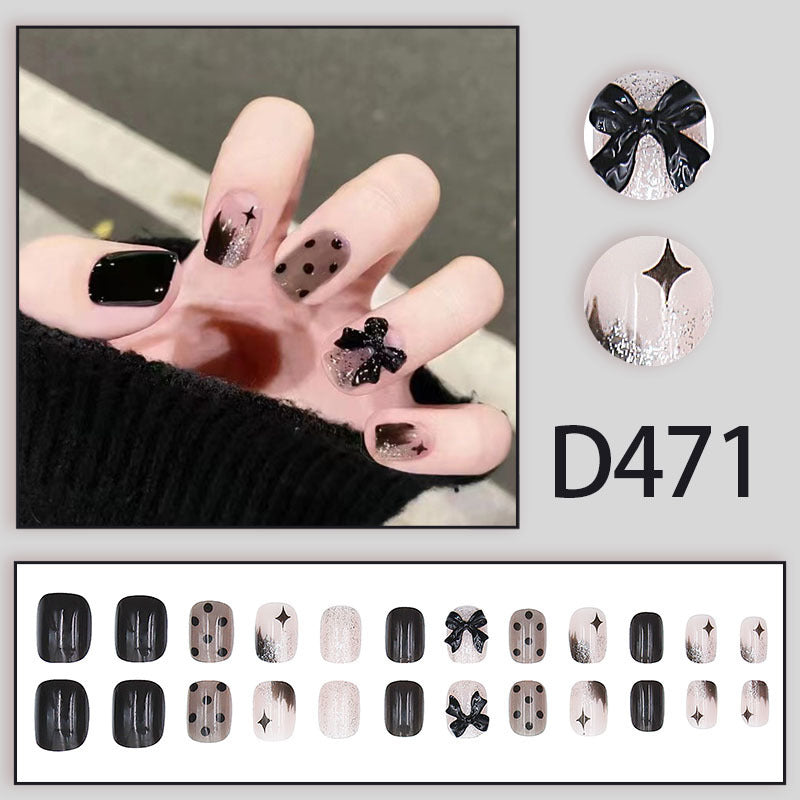 Black bow tie chic edgy girl high-end nail art