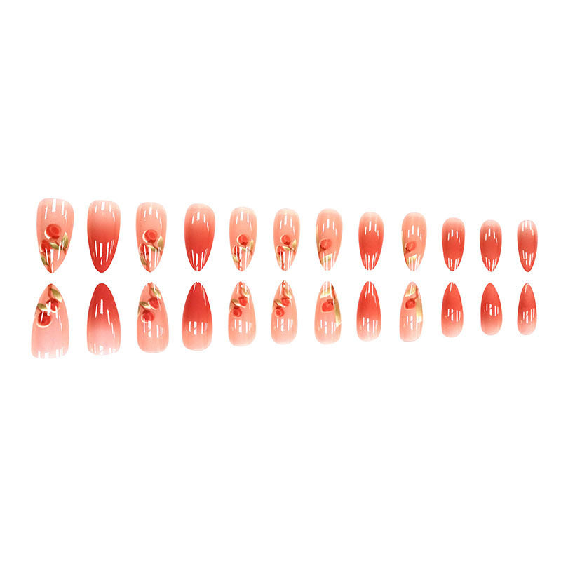 The peach-pink color is gradually applied to the nails.