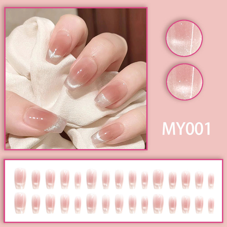 Long manicured nails on the eyes of Smile Cat