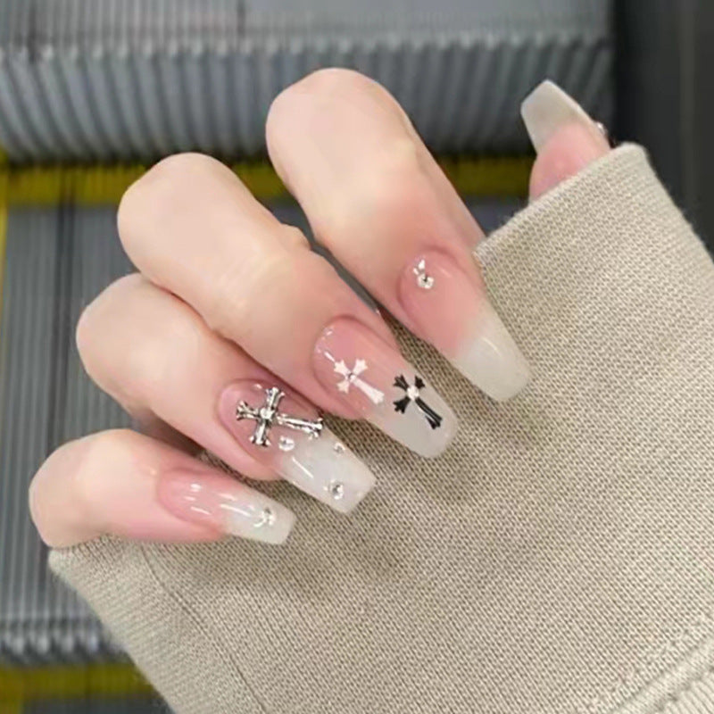 Diamond-studded flashing cross nail art