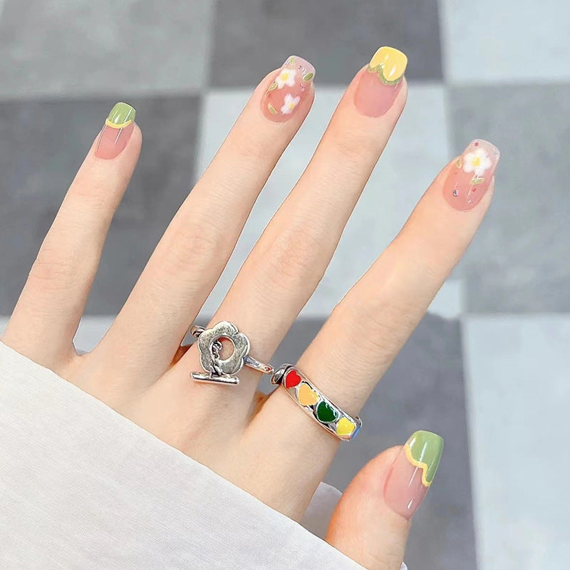 Floral, creamy, yellow, tender, green, sweet, adorn the nails