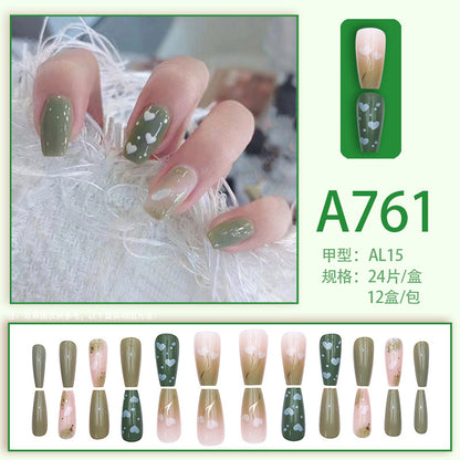 Green minimalist heart-shaped flower nail art