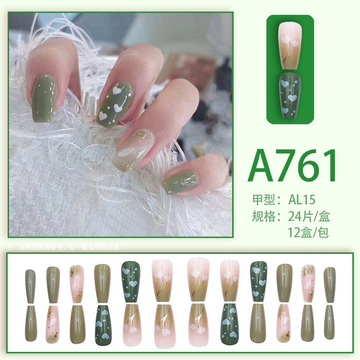 Green minimalist heart-shaped flower nail art