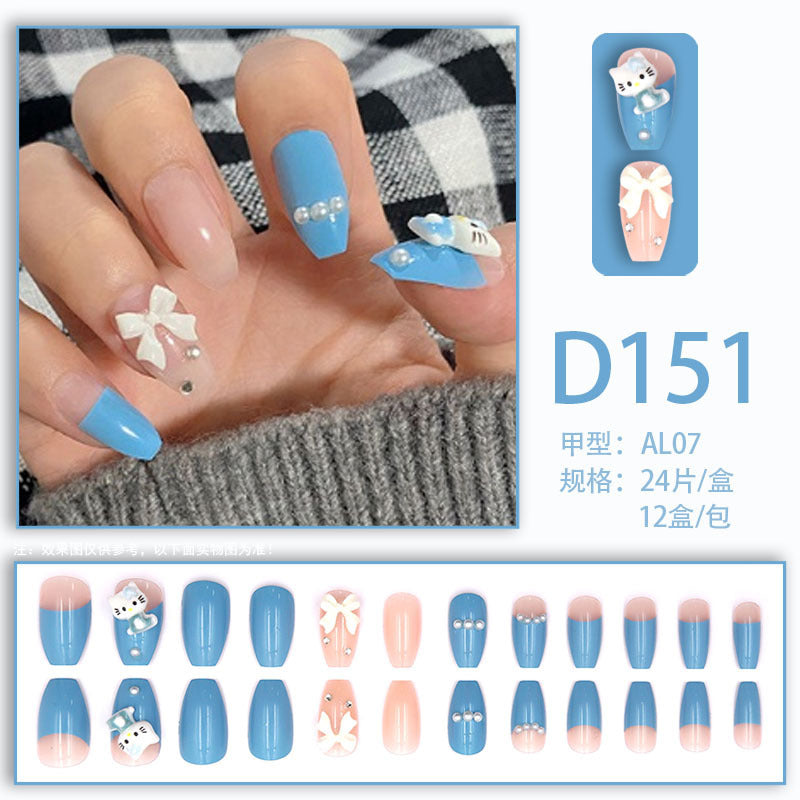 Cute cat wearing a stylish blue manicure