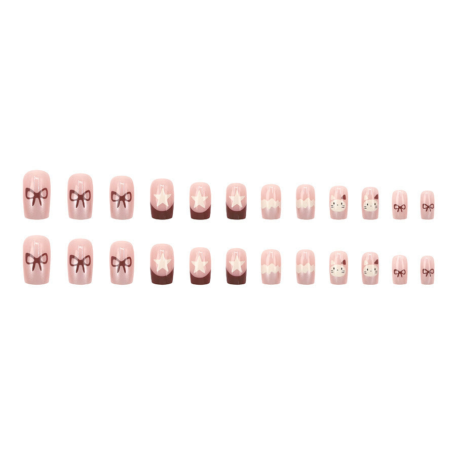Ice cream cat with a brown bow-shaped nail polish