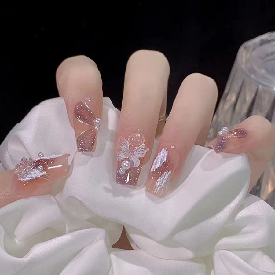 Pearl crystal butterfly rose nail art