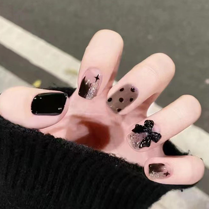 Black bow tie chic edgy girl high-end nail art