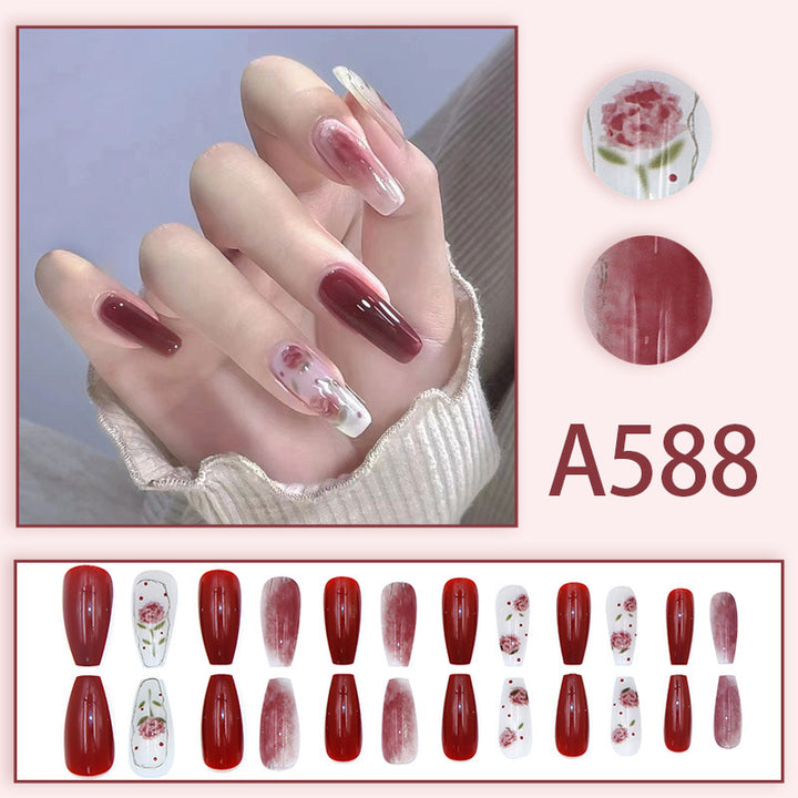 Red roses adorned with nails