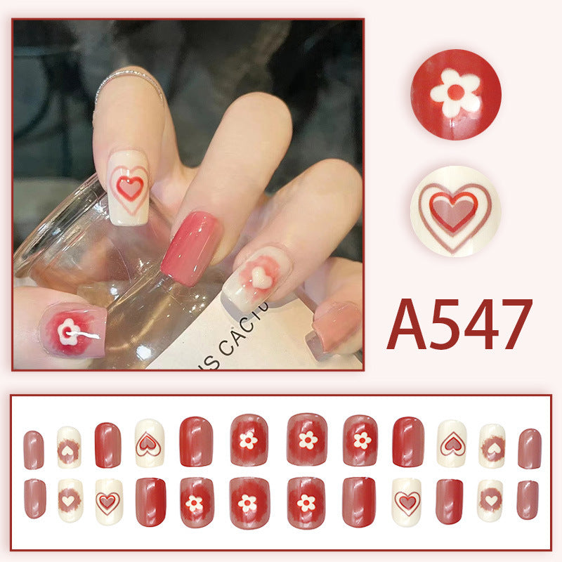 Pink and white heart-shaped small flower nail art
