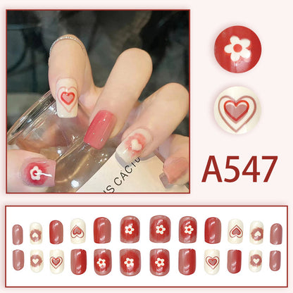 Pink and white heart-shaped small flower nail art