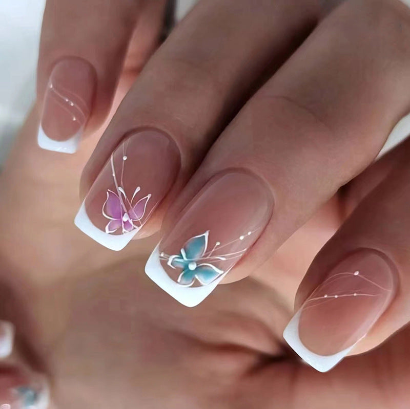 The ethereal and dreamy butterfly-like girl with fashionable attire and adorned nails
