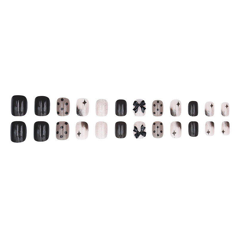 Black bow tie chic edgy girl high-end nail art