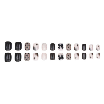 Black bow tie chic edgy girl high-end nail art