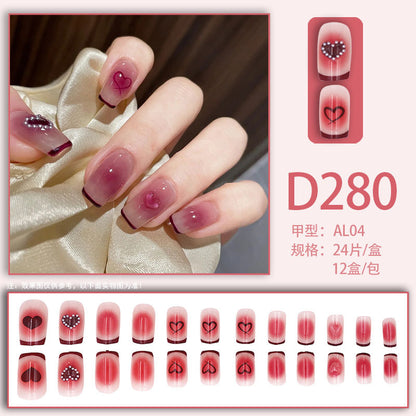 Blush ice-painted heart-shaped nail art