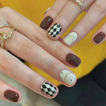 Diamond-shaped lines with polka dots on the nails
