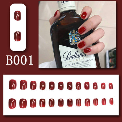 Dark red solid-colored manicure