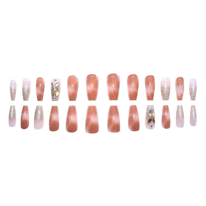 Ultra-glossy champagne-colored manicure