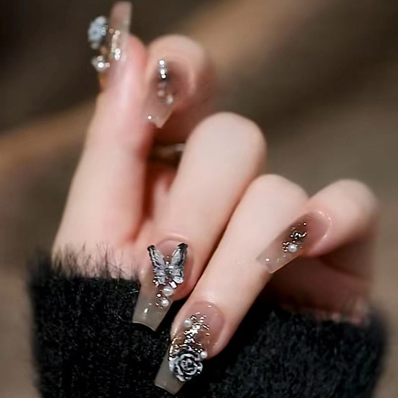 Long-style camellia butterfly manicure