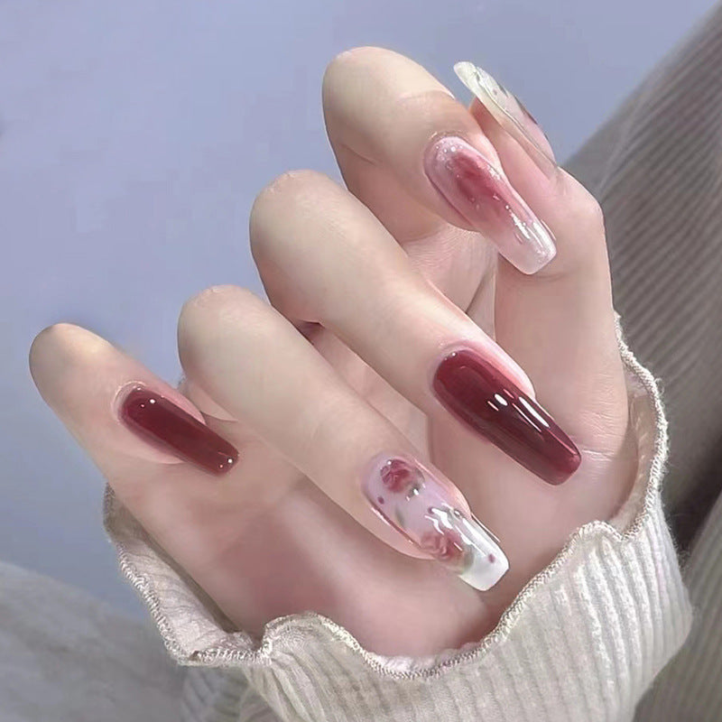 Red roses adorned with nails