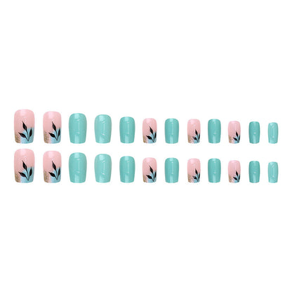 Leaf Buling's glittering green nail polish