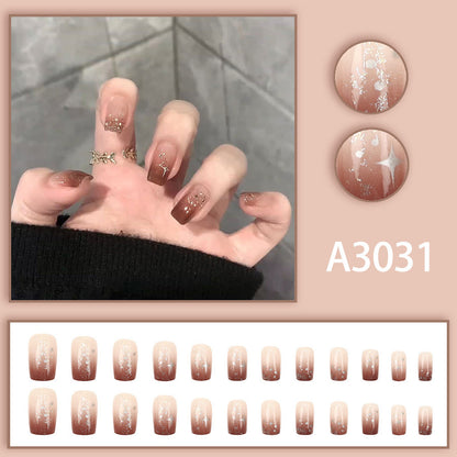High-end and luxurious aesthetic manicure with a gradient of warm caramel and amber tones, creating a sense of atmosphere.
