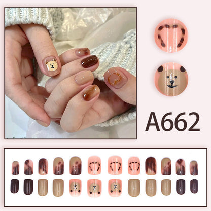 Cute cartoon teddy bear wearing nail polish