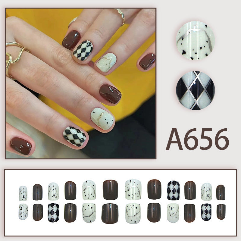 Diamond-shaped lines with polka dots on the nails
