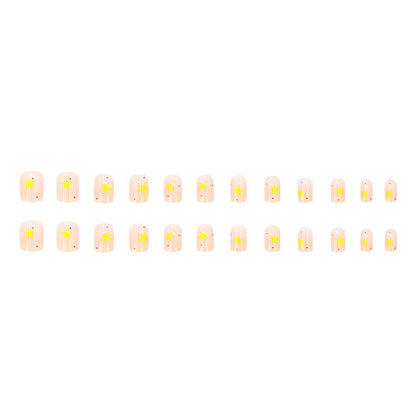 Cream-colored gradient yellow star nail polish