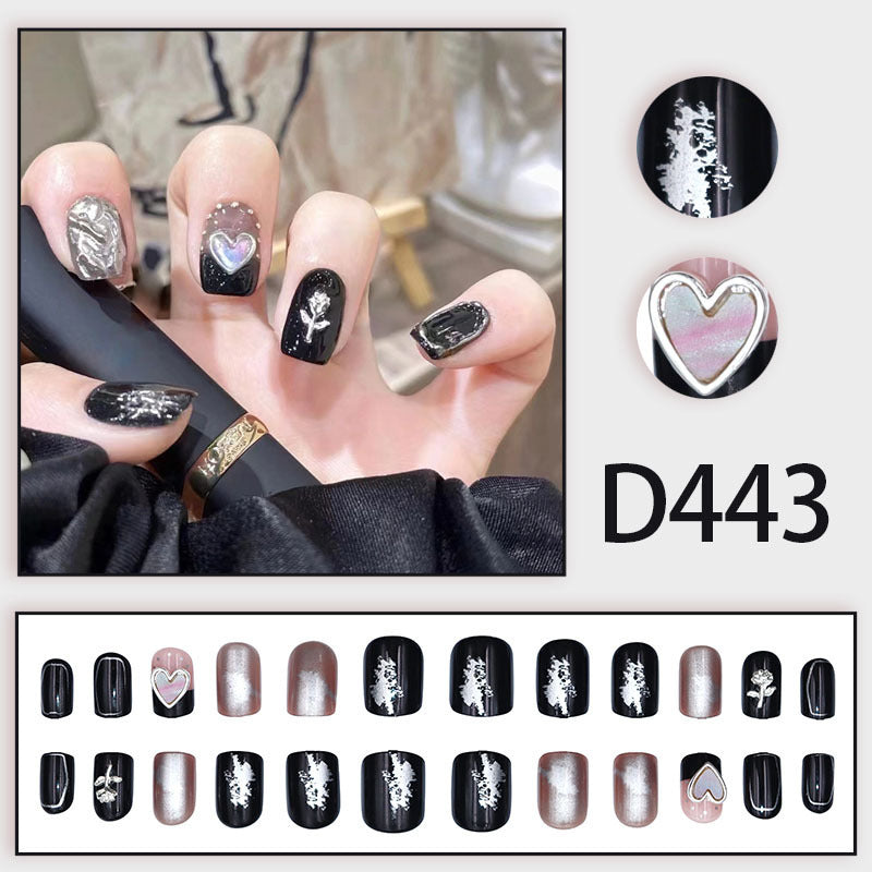 Black mirror-shaped heart-shaped rose gold manicure with diamonds