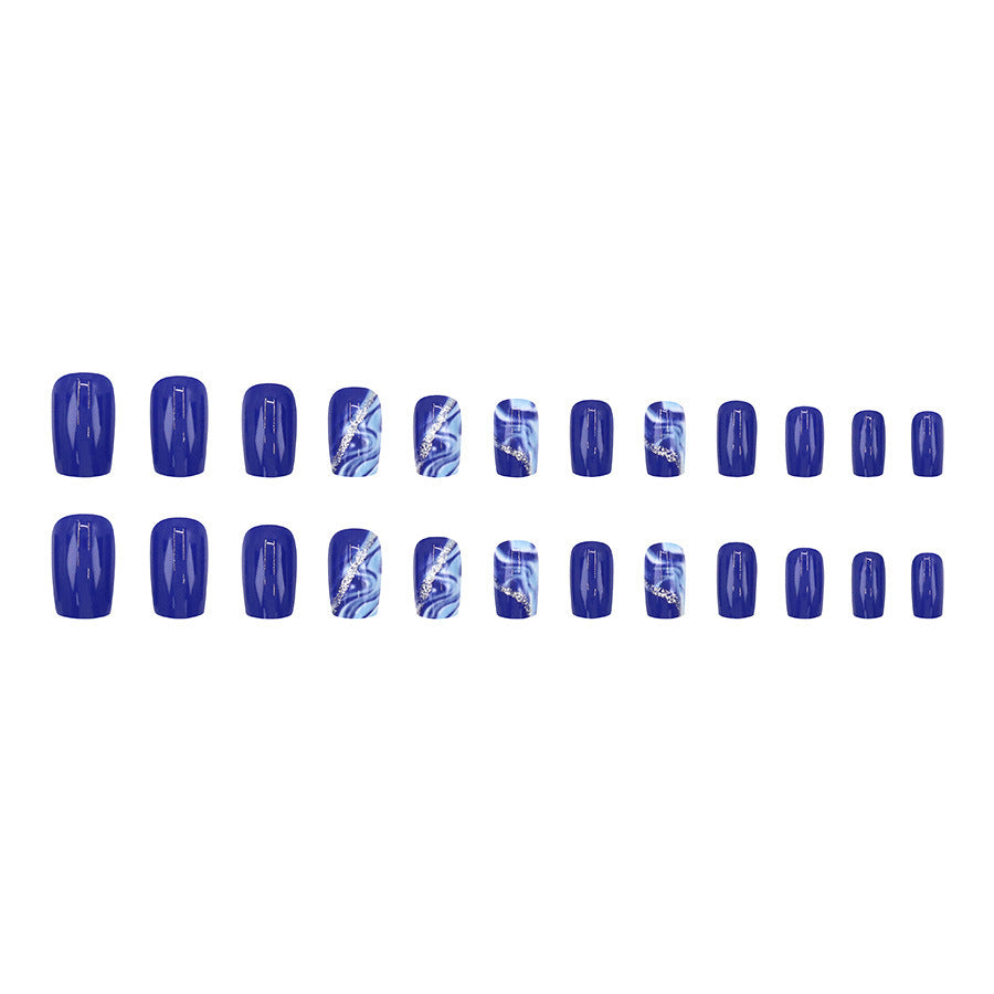 Blue shading with golden stripes on a long-style manicure